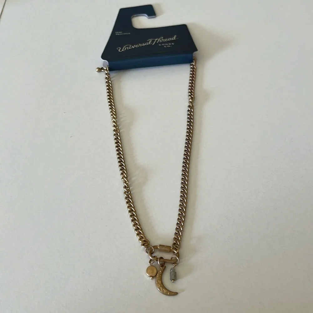 Universal Thread Crescent Necklace